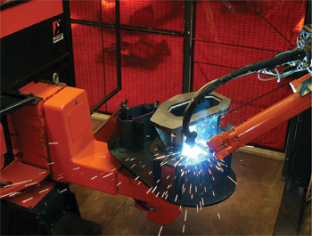 A servo-controlled arc-welding robot and three-axis positioner form the heart of a new welding cell.