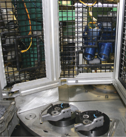 Once the cell operator enters part number the staking cell's vision system checks to verify