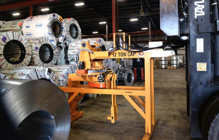 Custom Forklift Attachment Unloads Coils at Stamping Plant