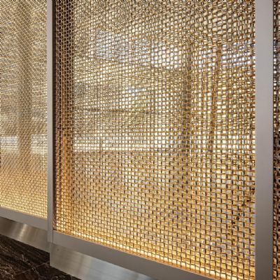 Wire Mesh Serves As a Dramatic Focal Feature in New Office T...