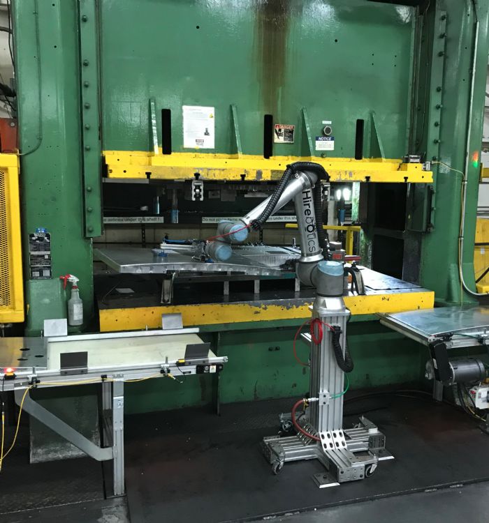 Cobots-press-tending-grip-part