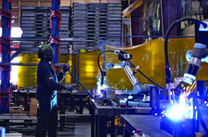 welder-working-with-welding-cobot-hirebotics