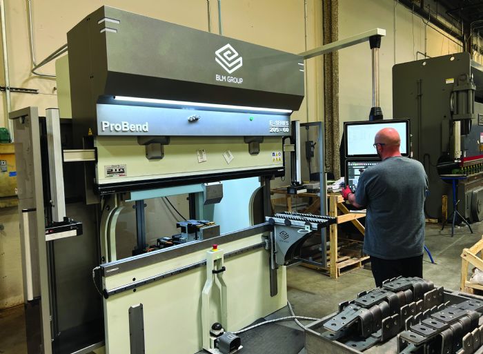 This 60-ton all-electric press brake produces smaller parts such as clips, often from blanks cut on the 2D laser cutting machine, while an older large-bed brake handles larger pieces.