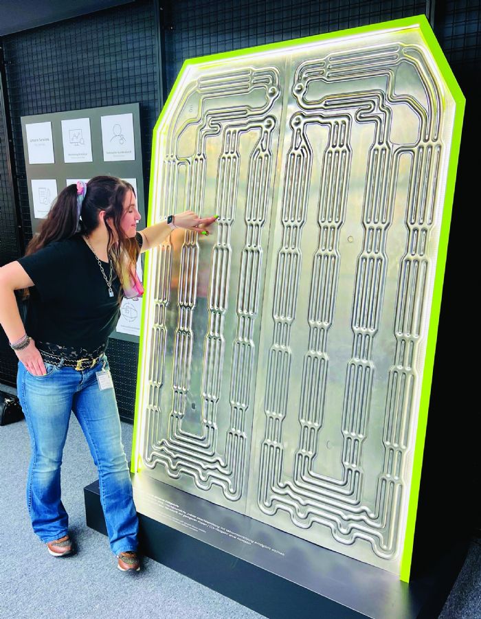 Cecile Pera Inspects Laser Welded Cooling Plate